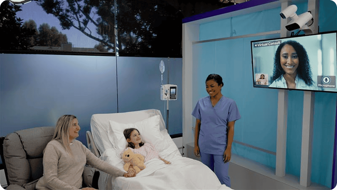 A scene depicting a child in a hospital bed sitting next to a woman and a healthcare professional