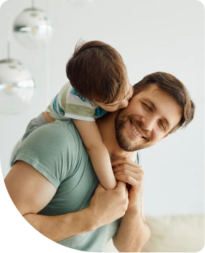 Parent carrying his child on his back