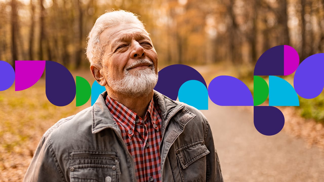 Senior man looking up with his face to the sky
