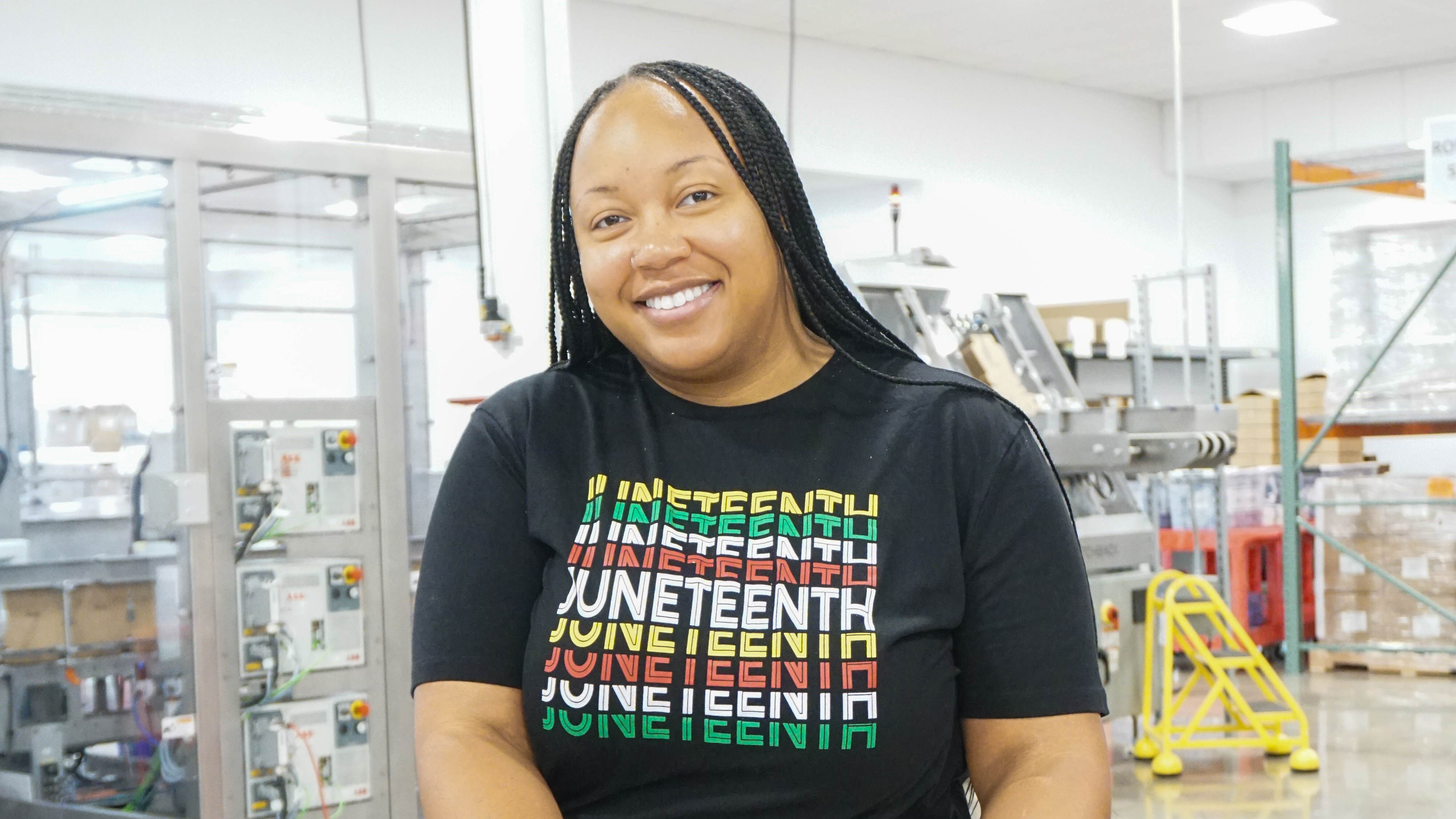 Woman wearing Juneteenth t-shirt