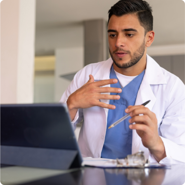 Doctor using a tablet on a virtual call