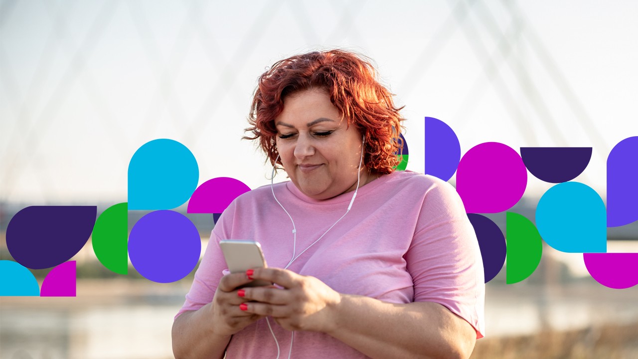  A woman using her phone to listen to music